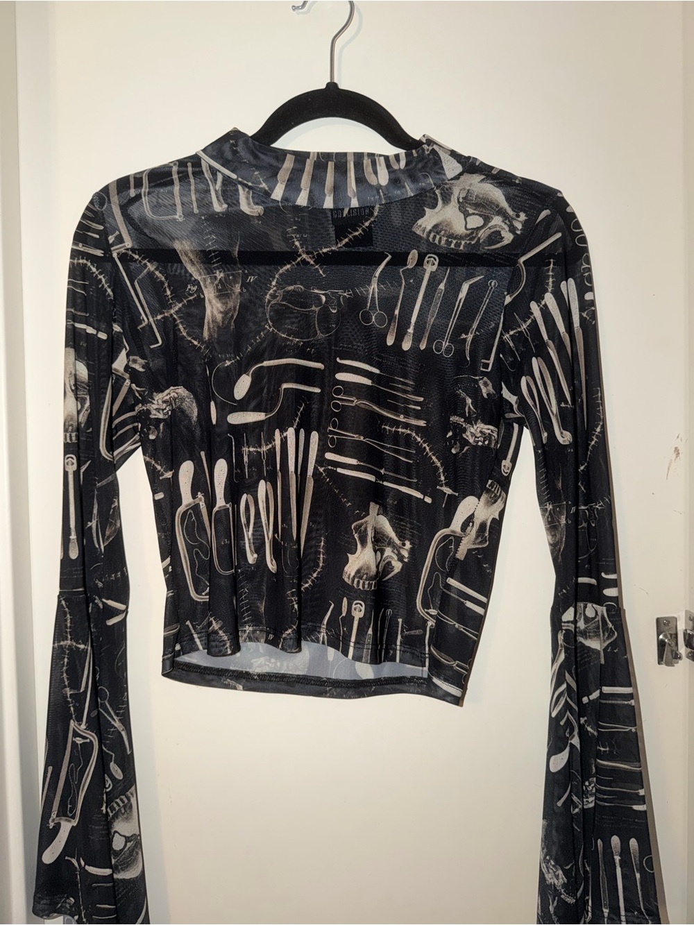 Black Mesh Long-Sleeve Graphic Crop Top with Medical Tools Print